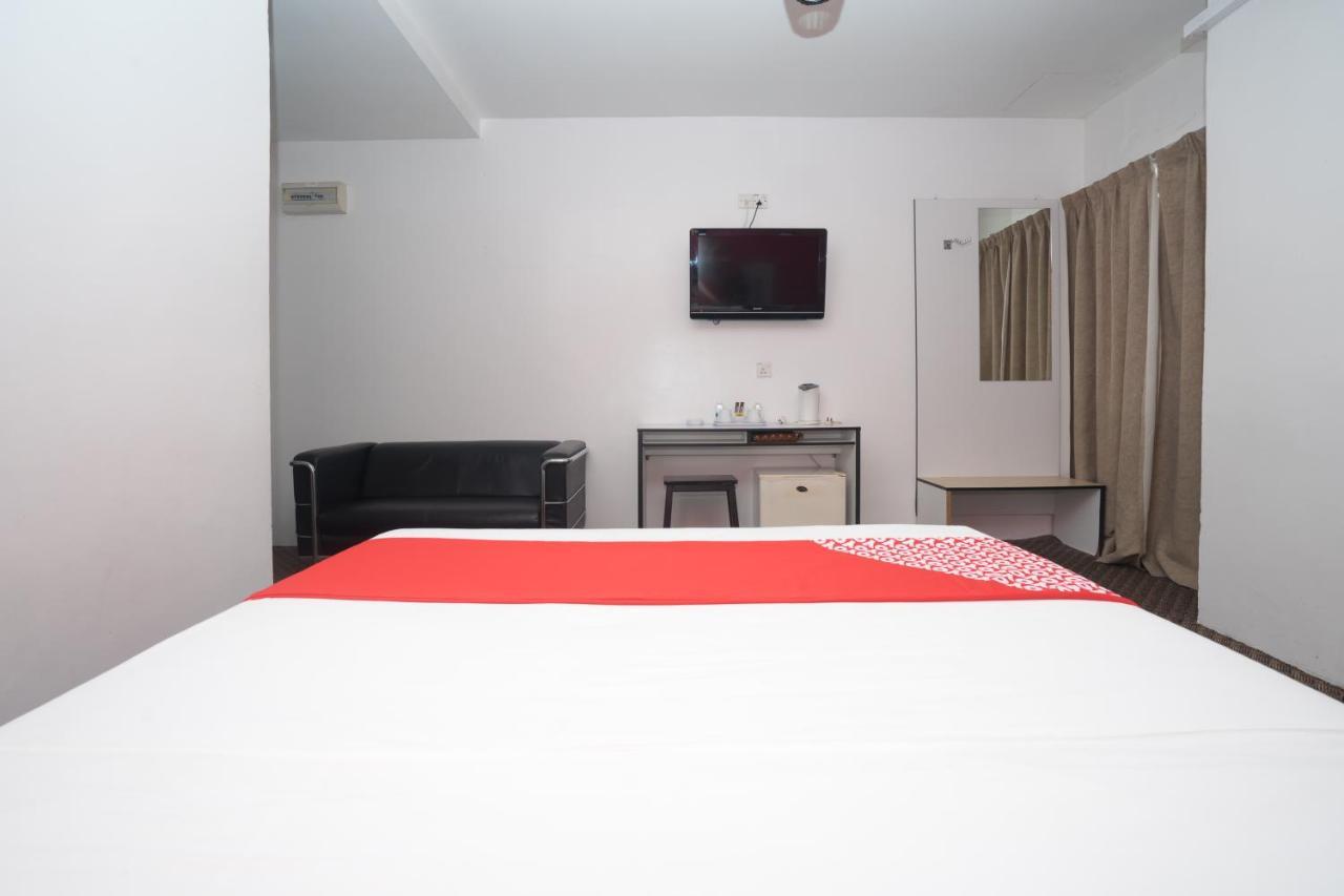 Capital O Ridel Hotel